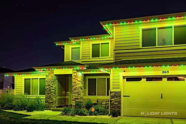 Permanent roofline lights installed along the full eaves of a Pennsylvania home