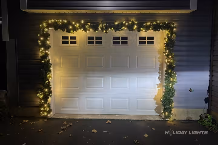 Professional residential Christmas light installation in Roxborough, Pennsylvania — Garage Door Garland Display