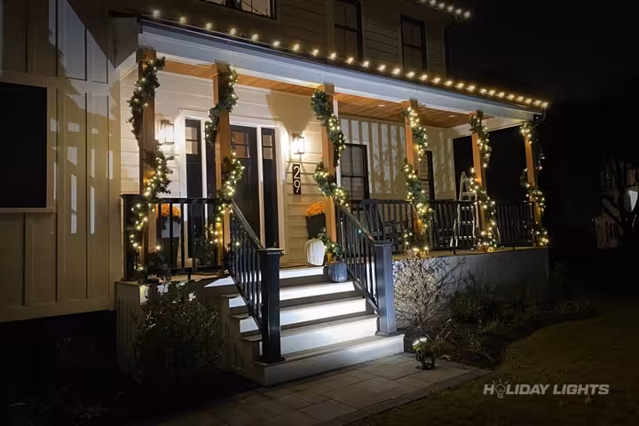 Professional residential Christmas light installation in Mount Airy, Pennsylvania — Porch Garland Decorations