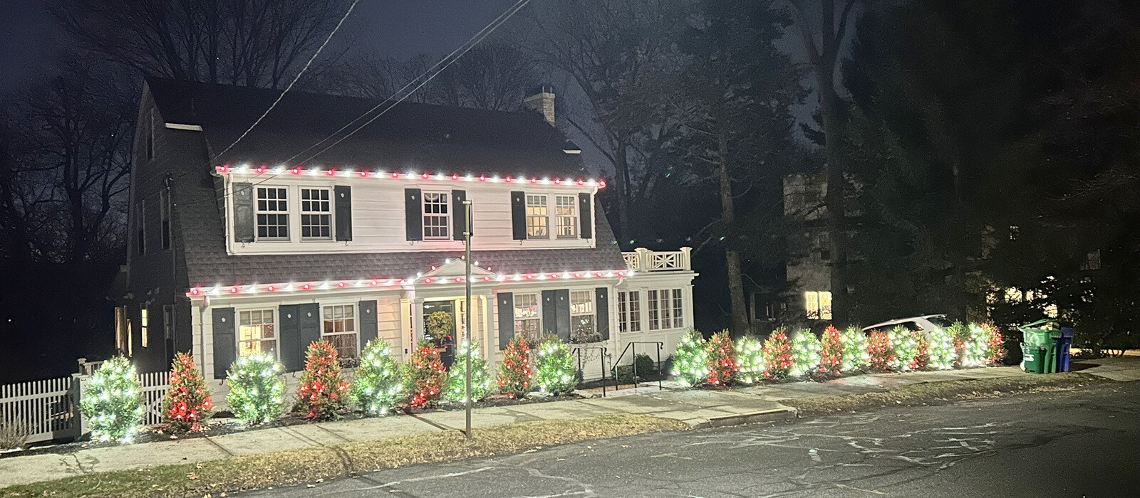 Festive Radnor home at night